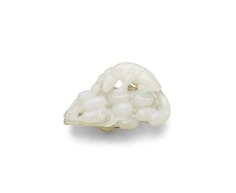 A white jade carving of a squirrel on grapesQing dynastyOf pyramidal shape and fairly thin section, the squirrel depicted sca