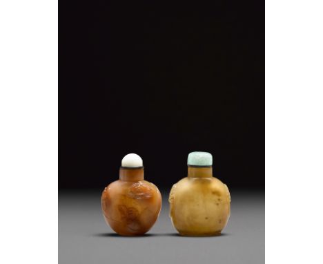 Two agate snuff bottles19th/early 20th centuryBoth well-hollowed; the first finished with a flat lip, recessed foot, carved t
