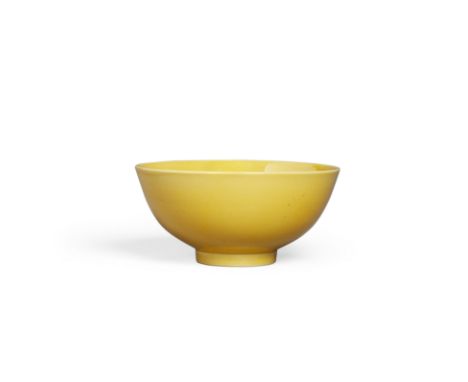 A fine yellow glazed porcelain bowlQianlong six-character seal mark and of the periodThe deep rounded side walls rising from 