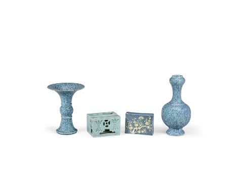 A group of four robin's egg blue miniature porcelains19th/20th centuryThe first a vase of archaistic gu beaker-form with a fl