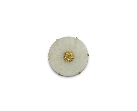 A carved jade bi disc in a gilt metal mountThe jade, Late Qing/Republic periodThe visible side of the thinly sectioned green-