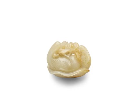 A white and russet jade carving of two ducksQing dynastyOf irregular oval contour, the two birds nestling on a curving lotus 