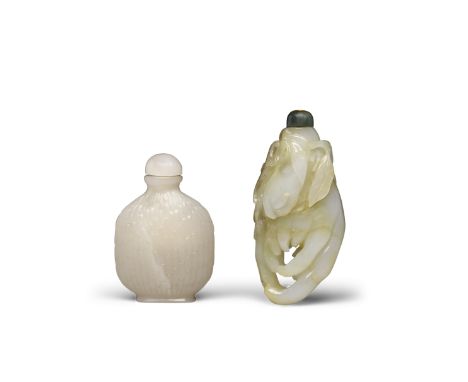Two carved snuff bottles20th centuryThe first converted from a jade carving of a Buddha's hand citron, its side decorated wit