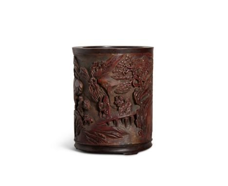 A Hardwood-Mounted Bamboo Brush PotQing dynasty, signed Wang YuanguThe dark bamboo carved and undercut with a continuous moun