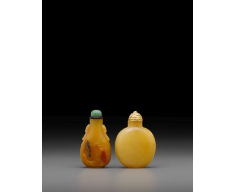 Two agate snuff bottlesBoth well-hollowed, the first a pear-shaped bottle carved in low relief to one side depicting a sage s