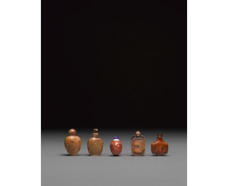 Five organic material snuff bottlesIncluding three burl wood bottles, one bamboo bottle carved as a peapod with leaves, and o