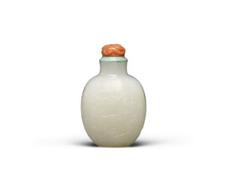 A carved white jade snuff bottleLate 19th/20th centuryWell-hollowed, the ovoid bottle supported by a recessed foot, rising to