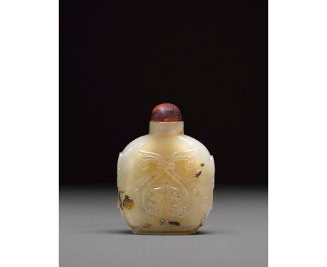 A large agate cabinet bottleEarly 20th centuryWell-hollowed, the flattened bottle carved to one side with paired chilong with