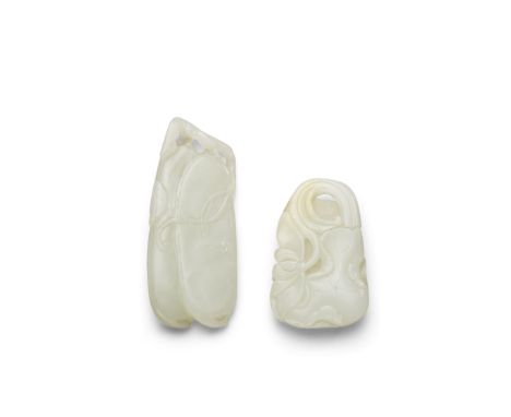 Two white jade pendantsEach thinly sectioned: the first of two pea pods hanging from a common leafy stem, finished on both si