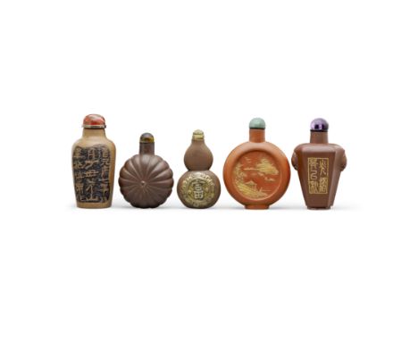 Five Yixing stoneware snuff bottles19th/20th centuryIn chocolate-brown or brick-red color; the first carved as a chrysanthemu