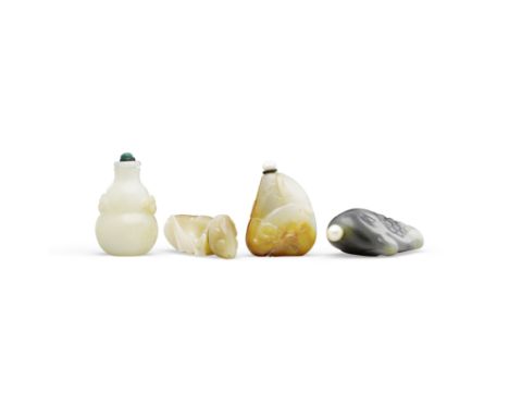 Four carved jade snuff bottlesThe first a well-hollowed double-gourd bottle with recessed lip and foot, the upper lobe flanke