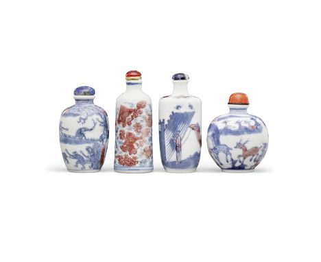Four underglaze blue and copper-red decorated porcelain snuff bottles19th century and laterIncluding a globular bottle decora