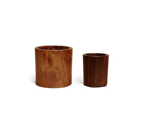 Two hardwood brush potsThe first a huanghuali cylidrical brushpot carved from well-figured wood, the second a zitan brushpot 
