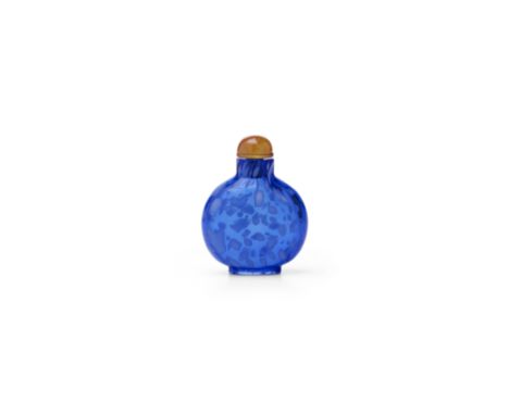 A WHITE-MOTTLED TRANSPARENT BLUE GLASS SNUFF BOTTLE1730-1860Of flattened globular form, surmounted by a gently flared neck wi