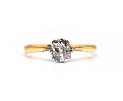 A GOLD AND DIAMOND SINGLE STONE RINGClaw set with a cushion shaped diamond (estimated 0.75ct), ring size M and a half, gross 