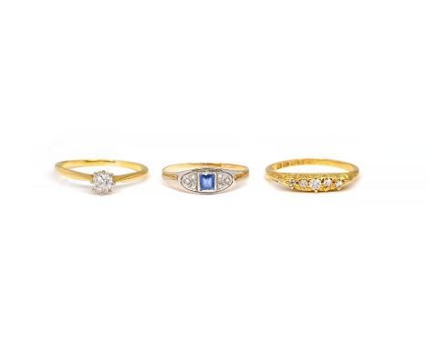 THREE DIAMOND RINGS (3)Comprising; a diamond single stone ring, claw set with an old cut diamond, size P, a carved half hoop 