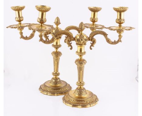 A PAIR OF ORMOLU TWIN-LIGHT CANDLESTICKS (2)Coleridge Collection, Candlesticks early 18th Century, the branches later The sha