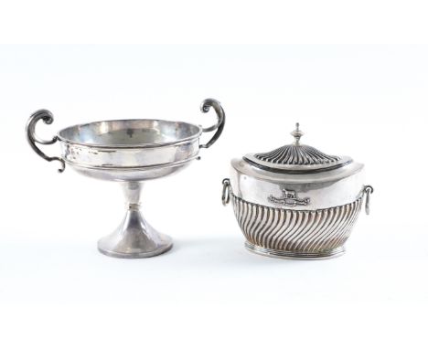 A SILVER TWIN HANDLED TEA CADDY AND A SILVER TWIN HANDLED BONBON DISH (2)The oval tea caddy with partly spiral fluted decorat