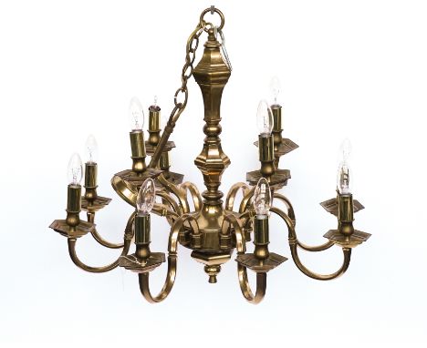 A DUTCH BRASS TWELVE-LIGHT CHANDELIER20th CenturyWith turned central stem, hexagonal bobeche on each scrolling arm, with ball