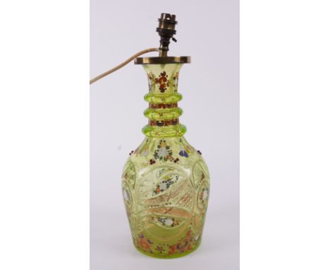 A BOHEMIAN LIME GREEN GLASS DECANTER ADAPTED TABLE LAMPFor the Persian Market, Late 19th Century With cut glass and enamel de