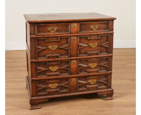 A CHARLES II AND LATER OAK GEOMETRIC MOULDED FOUR DRAWER CHEST84cm wide; 55cm deep; 84cm highCondition report:&nbsp;Later han