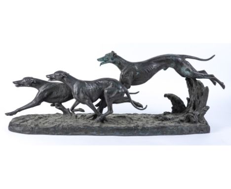 MAXIMILIAN FIOT (FRENCH 1886-1953): A PATINATED BRONZE GROUP OF THREE GREYHOUNDSCast by Susse Freres Foundry, circa 1930Depic