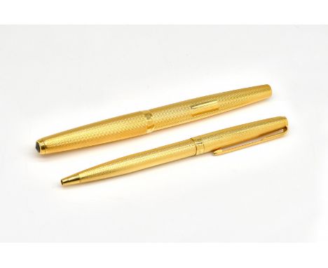 A PARKER 61 18 CT GOLD CASED FOUNTAIN PEN AND A MATCHING BALL POINT PEN (2)Both with engine turned decoration, the fountain p