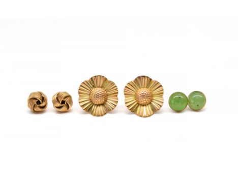 A PAIR OF 9CT TWO COLOUR GOLD EARSTUDS AND TWO FURTHER PAIRS OF EARSTUDS (3)The two colour gold earstuds designed as flowerhe