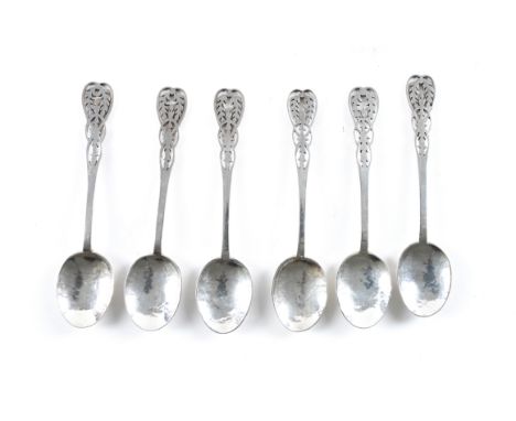 SIX SIMILAR SILVER TEASPOONS (6)Each with pierced decoration to the handle and with a martele finish to the bowl, comprising;
