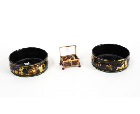 A PAIR OF VICTORIAN LACQUERED PAPIER-MACHE WINE COASTERS AND A GERMAN JASPER AGATE MOUNTED BOX (3)With gilt heightened foliat