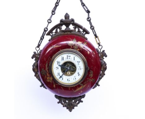A FRENCH GILT-BRASS MOUNTED SANG-DE-BEOUF HANGING WALL CLOCKLate 19th CenturyThe enamelled porcelain case decorated with gilt