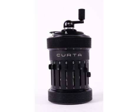 A TYPE 1 CURTA CALCULATOR1960In original black cylinder case, serial number 44870 to the base, 12cm high in caseCondition Rep
