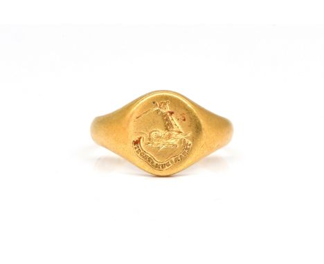 AN 18CT GOLD SIGNET RINGCrest and motto seal engraved, Birmingham 1910, ring size N and a half, weight 7.3 gmsCondition repor