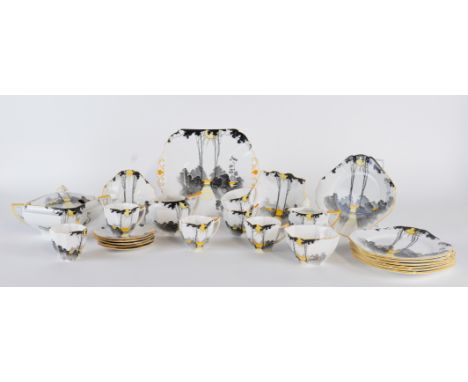 A GROUP OF SHELLEY `SUNSET AND TALL TREES' TEA AND DINNER WARESCirca 1930Of Queen Anne shape, comprising;  a two-handled ture