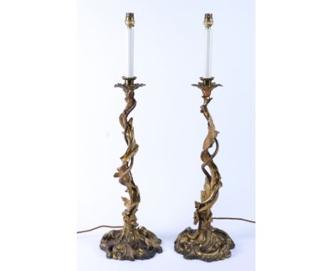 A PAIR OF WILLIAM IV ROCOCO REVIVAL ORMOLU CANDLESTICK TABLE LAMPS (2)Circa 1830With entwined serpents amid foliage, later ad