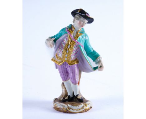 A MEISSEN FIGURE OF A GALLANTLate 19th centuryModelled standing against a tree stump wearing a black tricorn hat, turquoise j