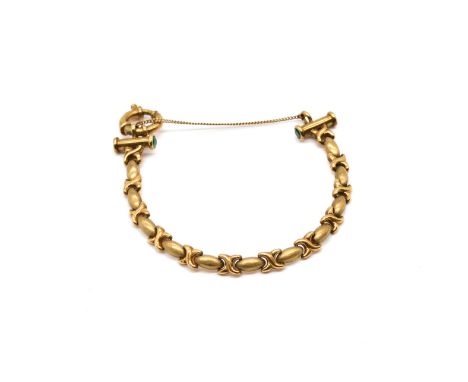 A GOLD AND GREEN GEM SET BRACELETIn an oval and X shaped link design, with a boltring and bar clasp, detailed 9 K Italy, gros