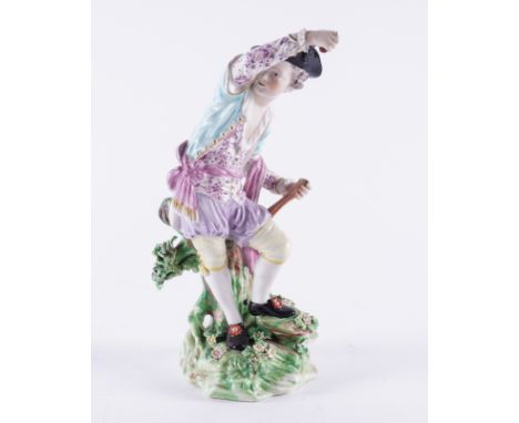 A TALL DERBY FIGURE OF EMBLEMATIC OF FIRE FROM A SET OF ELEMENTSCirca 1770-75Modelled as a young man standing on a grassy mou