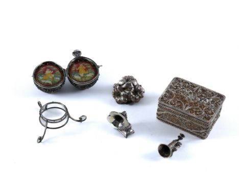 A RUSSIAN SILVER FILIGREE AND PAINTED LACQUER EGG SHAPED ORNAMENT, WITH A STAND AND FOUR FURTHER ITEMS (6)The egg shaped orna