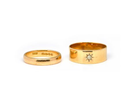 A DIAMOND GYPSY RING AND A GOLD BAND RING (2)The band ring star set with an old cut diamond, size T 1/2 , London 1916 and a p