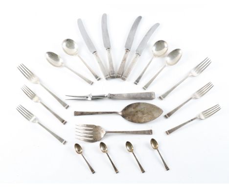 A SILVER PART TABLE SERVICEComprising; a pair of fish servers, a carving knife and fork, two tablespoons, six soup spoons, fo