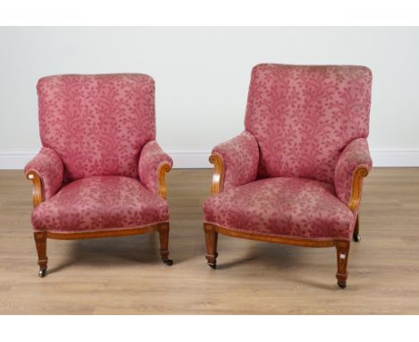 A GRADUATED PAIR OF 19TH CENTURY MARQUETRY INLAID SATINWOOD EASY ARMCHAIRS (2)The larger, 72cm wide; 86cm high, the other 72c