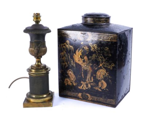 A LARGE TOLE-WARE CHINOISERIE DECORATED TEA CANISTER AND A LOUIS XVI STYLE GILT-METAL LAMP (2)19th CenturyThe canister decora