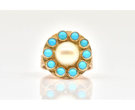 A GOLD, TURQUOISE AND CULTURED PEARL RINGMounted with the single cultured pearl within a surround of ten turquoise, detailed 