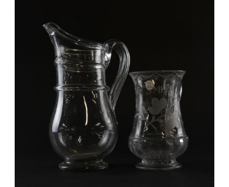 AN ENGRAVED GLASS TANKARDLate 18th centuryof baluster form, engraved  with hops and barley beneath `Iane Smith', the lower pa