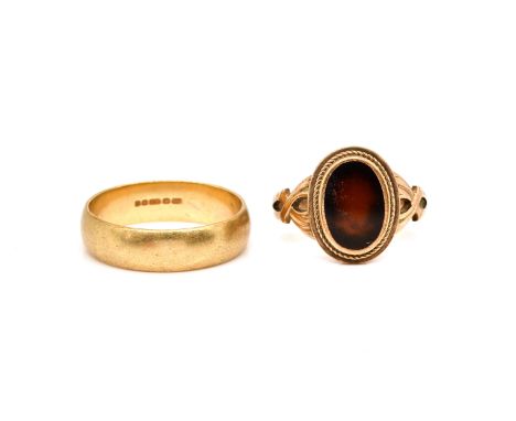 A 9CT GOLD PLAIN WEDDING RING AND A SIGNET RING (2)The wedding ring London 1982, ring size Y and a half, weight 6 gms, the bl