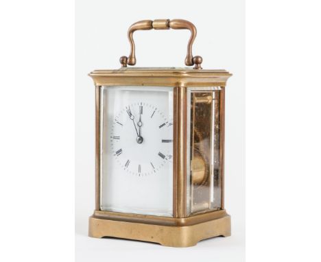 A FRENCH BRASS CARRIAGE CLOCKCirca 1890In a Corniche case, with replaced platform escapement, striking on a bell, together wi