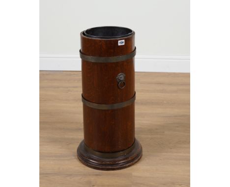 AN EARLY 20TH CENTURY BRASS BOUND COOPER MADE OAK CYLINDRICAL STICK STAND34cm diameter; 63cm highCondition report:&nbsp;Liner