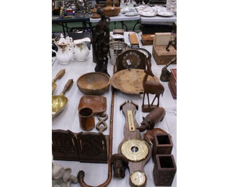 A LARGE QUANTITY OF TREEN TO INCLUDE A LARGE CARVED ROOTWOOD FIGURE OF A LADY, BOOKENDS, BRUSH POTS, CARVED WOODEN ANIMALS TO