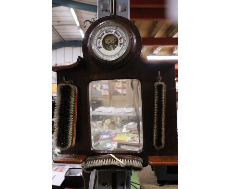 A WALL HANGING BRUSH AND MIRROR SET INCORPORATING A BAROMETER